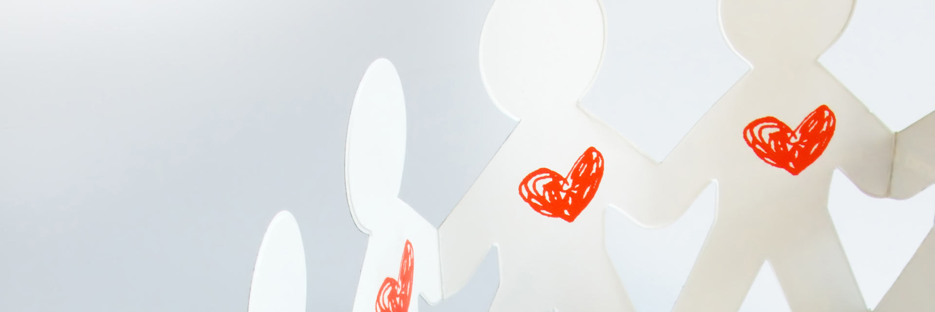 Cut out figures with red hearts